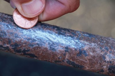 rub penny on Lead Pipe