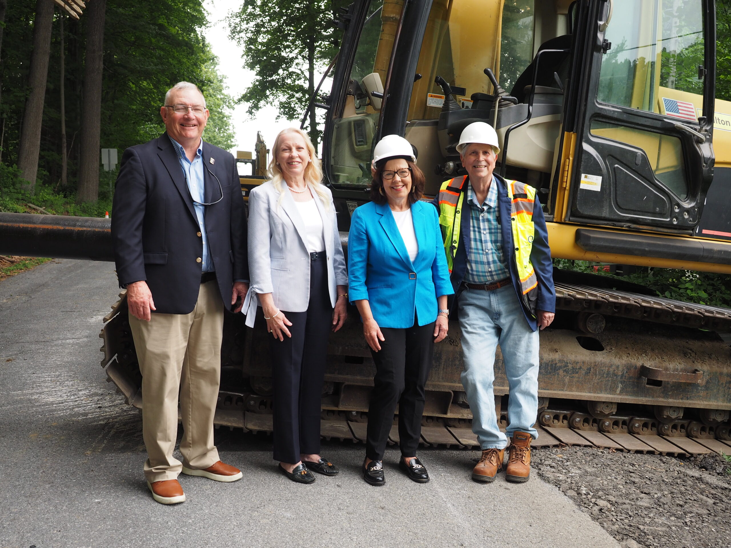 Gathering to mark the start of construction on the Jenkinsville Community Water Project are: from left, Queensbury Fourth Ward Council Member Tim McNulty, Second Ward Council Member Rachel Hajos, Deputy Supervisor Jean Lapper and Supervisor John Strough.